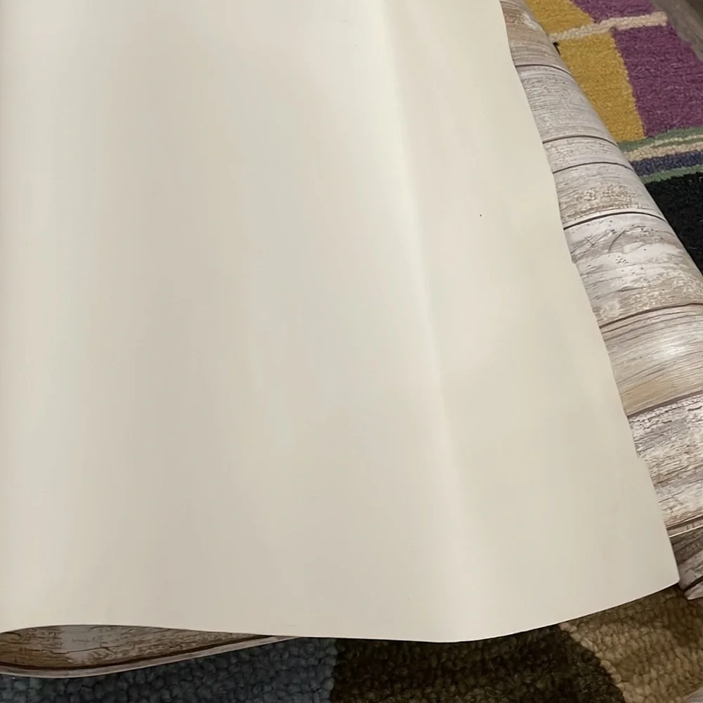 Two rolls of faux wood removable wallpaper